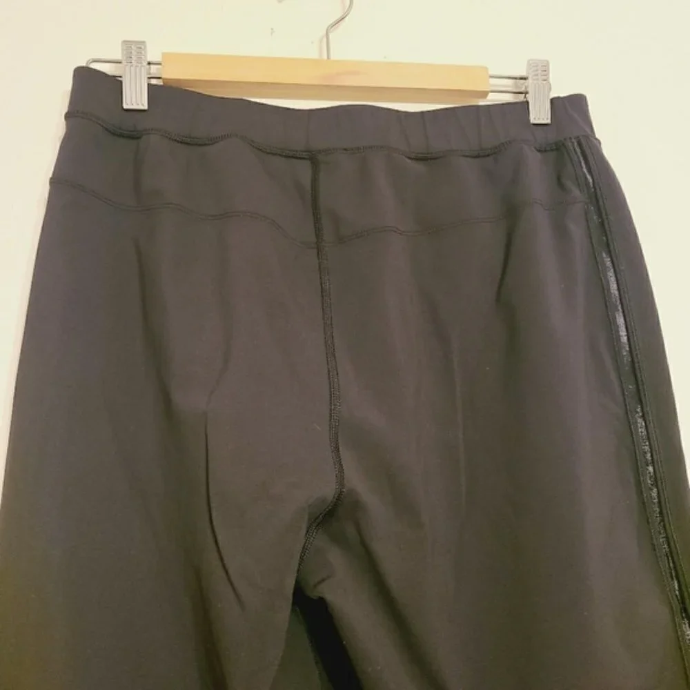 Lululemon | Women's Black Cross Front Athleisure Capri Pants (Size 8)